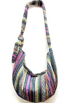 a multicolored bag hanging on a wall