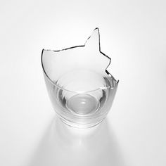 a broken glass sitting on top of a table