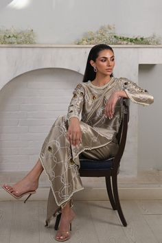 Elegantly crafted from a metallic slate coloured tissue, a hand embellished column shirt is adorned with appliquéd velvet roses and features a keyhole neckline. Accented with beaded borders, the shirt is paired with a matching rawsilk shalwar.  Model Height is 5'10 shirt length is 56" Sania Maskatiya, Suits Design, Pakistani Dress, Embroidery Suits Design, Keyhole Neckline, Pakistani Dress Design, Embroidery Suits, Asian Outfits, How To Dye Fabric