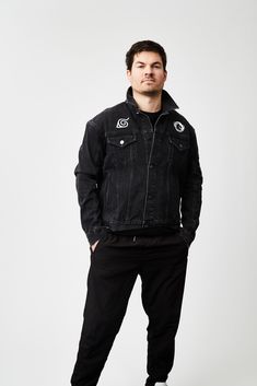 This black denim jacket keeps it subtle with tonal raised embroidery throughout and a dual chest print. Custom to the stitch, classic denim jacket styling with a relaxed fit, and Team Liquid branded shank buttons. On the inside, a white "paint" style Ninetails print adds a hidden touch for fandom. Details 100% Cotton, Premium Black Denim Leaf Village and Team Liquid swirl logo dual chest prints "Uzumaki Naruto" tonal raised embroidery down the sleeve Kunai tonal raised embroidery on back White " Urban Black Cotton Denim Jacket, Black Cotton Urban Denim Jacket, Urban Black Denim Jacket For Spring, Black Cotton Denim Jacket For Spring, Black Urban Denim Jacket For Streetwear, Casual Black Denim Jacket For Spring, Urban Style Washed Black Denim Jacket For Streetwear, Black Denim Jacket For Streetwear In Spring, Washed Black Cotton Denim Jacket For Streetwear