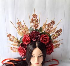 This wonderful Burgundy halo crown wedding will make you the center of a festival or wedding. Your friends will appreciate this Gold lace halo headpiece bridal. Crown spikes are made of wood spiked. Spikes are neatly glued to the metal headband that I wore with tape. Gold spikes are painted with gold paint.  The flower headdress is decorated with burgundy roses and lace. Each flower is securely fastened with felt.  The height of the spiked is about 7.48 inches (19 cm). More of my spiked halo crown you can see here https://www.etsy.com/ru/shop/byIraFomina?ref=hdr_shop_menu§ion_id=26561099 Address to me on any question. I will be happy to help you. Halo Crown Wedding, Halo Headpiece, Burgundy Roses, Flower Headdress, Halo Crown, Metal Headband, Headpiece Bridal, Wedding Gold, Crown Wedding