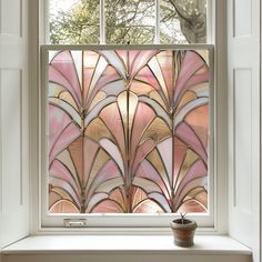 a window with an artistic glass design in it