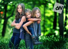 three girls hugging each other in front of trees and grass with the words chicago on it