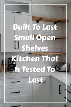 a kitchen with white cabinets and open shelves