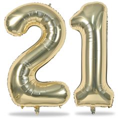 the number twenty two is made out of gold foil balloons and it's balloon like shape