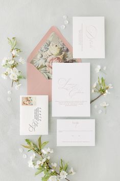 the wedding stationery is laid out and ready to be used