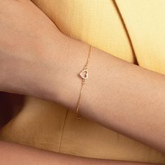 CZ Heart Bracelet in 14k Real Gold for Women - Heart Charm Bracelet - Mini Heart Bracelet - Love Bracelet - Everyday Bracelet - Gift for Her When you can't hold her hand, a little gift goes a long way. The tiniest of details can be the symbol of love. Simple is the way to go, and huge is the way to love. D E T A I L S   * Made to Order. * 100% 14k Solid Gold * Choice of Gold Color: Yellow Gold, Rose Gold, White Gold * Gemstone: Cubic Zirconia * Charm height: 6 mm/0.23 inch * Charm width: 7 mm/0.27 inch * Chain length is adjustable from 6 to 7 inches. * Ready to Ship in 1-3 Business Days * 100% US sourced * 2 Years Warranty * Free Express International Shipping * Free returns within 30 days from the order date A B O U T ∙ U S * All personalization is done by hand. Because it's better that w Gold Heart Shaped Diamond Bracelet, Heart-shaped Diamond Bracelet For Valentine's Day, Gold Diamond Bracelet With Heart Charm For Anniversary, Formal Fine Jewelry Heart Bracelet For Valentine's Day, Formal Rose Gold Heart Bracelets, Formal Rose Gold Heart Bracelet, 14k Yellow Gold Diamond Bracelet For Valentine's Day, Gold Diamond Heart Cut Bracelet For Gift, Gold Heart Cut Diamond Bracelet Gift