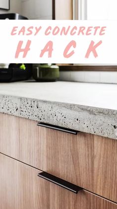 a sign that says easy concrete hack in front of a counter top with black handles