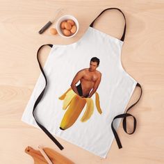 an apron with a photo of a shirtless man holding a banana