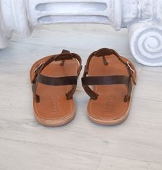 "SKOPELOS is named after a Greek island, and it's a T-strap sandal with a buckle closure lower than the ankle. A classic design, that many purchase year after year, in multiple colours. We are shipping all our sandals from Cyprus via TNT EXPRESS WORLDWIDE within 3-5 business days ALL ORDERS ARE SHIPPED VIA TNT EXPRESS WORLDWIDE (Please include a phone number at checkout, as it's required by the carrier). The shop Welcome to our shop where you can find comfortable, stylish, handmade, Greek-style