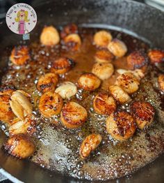 some food is cooking in a frying pan on the stove with water and oil