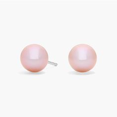 These luminous pink freshwater pearls have an eye-catching color. The earrings are set on 14k white gold posts with friction backs. Pink Pearl Earrings For Formal Occasions, Formal Pink Pearl Earrings, Classic Pink Pearl Drop Earrings, Pink Round Pearl Earrings For Formal Occasions, Pink Round Pearl Earrings For Formal Events, Classic Pink Pearl Drop Jewelry, Classic Pink Earrings For Formal Occasions, Elegant Pink Pearl Earrings In Sterling Silver, Elegant Pink Sterling Silver Pearl Earrings