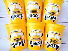 six yellow school bus ice cream containers stacked on top of each other