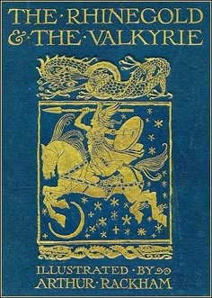 an old book with gold and blue cover