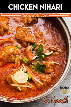 chicken nihari recipe in a pan with lemon wedges and parsley