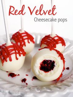 three red velvet cheesecake pops on a white plate with the words, red velvet cheesecake pops