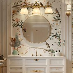 a bathroom with a vanity, mirror and lights on the wall next to each other