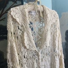 Bella Lace Crochet Sweater/Coat/Dress, Cream/Ivory With Scalloped Edges And Bell Sleeves And Every Feminine Touch Imaginable. Crochet Covered Buttons Down The Length Of The Front.Worn Once To A Wedding. Very Elegant, Lightweight For Summer Evenings. Smashing! Romantic, Totally Bohemian Romantic. Size Marked Is Large Fromnewport News. Reminds Me Of Bella's Wedding Coat In Twilight. So Delicate And Beautiful. Arm Pit To Arm Pit Across The Chest 18"Inches Shoulder To Hem 50"Inches Sleeve Length 28 White Crochet Trim Long Sleeve Cardigan, Fitted White Crochet Outerwear, White Long Sleeve Cardigan With Crochet Trim, Cream Long Sleeve Cardigan With Crochet Lace, Cream Long Sleeve Crochet Lace Cardigan, Crochet Sweater Coat, Crochet Duster, Lace Duster, Bella Wedding