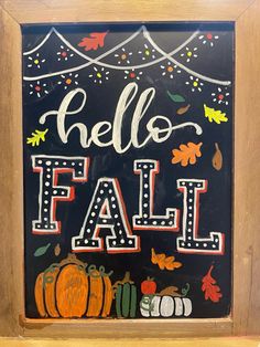 a chalkboard with the words hello fall painted on it