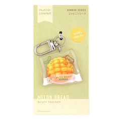 a plastic keychain with an image of a melon bread on it