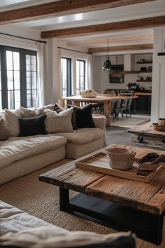 a living room filled with furniture and a fire place