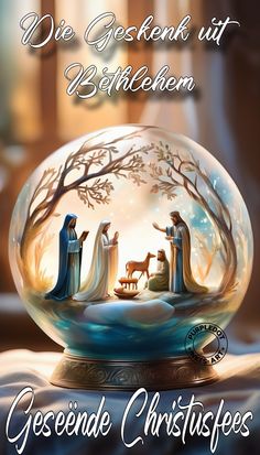 a snow globe with the nativity scene in it and an inscription that reads, we are