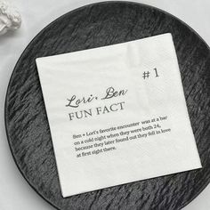 a black and white plate with a napkin on it that says, let's ben fun fact