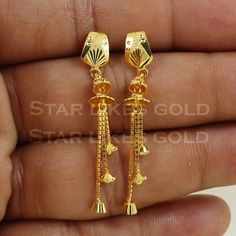 Elevate your style with these beautifully handcrafted gold earrings. Featuring a classic design and a comfortable fit, they add a refined touch to any look. Ideal for everyday wear or special occasions, they bring a subtle yet sophisticated sparkle. 18K Gold Dangle Earrings Metal is Real Gold Purity is 18kt Weight is 2.57 grams approx Max Length is 4 cm approx Max width is 1.1 cm approx ,  these earrings comes with normal backs, if you want real gold screw please contact. Please feel free to ask Simple Design 14k Gold Earrings, Gold 14k Elegant Earrings, Classic Yellow Gold Drop Chandelier Earrings, Gold-plated Yellow Gold Earrings, Elegant 22k Yellow Gold Plug Earrings, Elegant 22k Gold Danglers As Gift, Elegant 22k Gold Danglers For Gift, Yellow Gold Dangle Plug Earrings For Formal Events, Elegant Gold Earrings With Simple Design