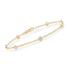 Classically styled and always appropriate, this .20 ct. t.w. diamond station bracelet is ultra chic. It features seven bezel-set, round brilliant-cut diamonds on a 14kt yellow gold cable chain. Wear it alone for a refined look, or pair with your other favorite bracelets for a touch of elegance. Lobster clasp, diamond station bracelet. Free shipping & easy 30-day returns. Fabulous jewelry. Great prices. Since 1952. Station Bracelet, Cuff Bracelets Handmade, Essential Oil Diffuser Bracelet, Diamond Birthstone, Wire Bangles, Gold Cross Necklace, Bracelets Gold Diamond, Bezel Set Diamond, Diffuser Bracelets