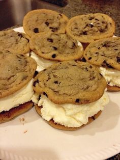 cookies and ice cream sandwiches on a paper plate