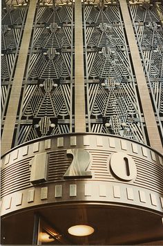 the top of a tall building with intricate designs on it