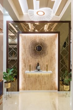 a bathroom with a sink, mirror and plants on the wall in front of it