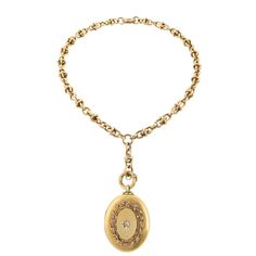 An English antique 18 karat gold pendant locket with diamonds. The pendant locket has 1 old mine-cut diamond with an approximate total weight of .18 carat, which is surrounded by a seed pearl-set garland. The locket is suspended from an antique 18 karat chain and has a split opening with two interior compartments. Circa 1890. Dimensions: Chain 25" length; locket 1-1/2" width (MG #15649) Necklaces Inspiration, Dreamy Jewelry, Antique Necklace Gold, Victorian Pendant Necklace, Princess Diamond Engagement Rings, Antique Necklaces Design, Gold Locket Necklace, Antique Necklaces, Pendant Locket