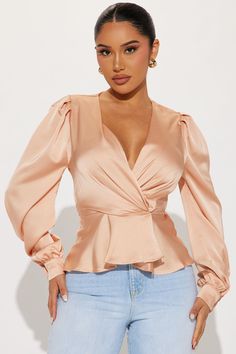 Available In Black, Champagne, Green, Royal, And Purple. Satin Blouse Puff Long Sleeve Surplice With Snap Button Peplum Elastic Back Seam Shell: 100% Polyester Imported | Linda Satin Peplum Blouse Top in Champagne size Small by Fashion Nova Satin Tops Blouses Classy, Satin Tops Blouses, Purple Satin Blouse, Champagne Fashion, Fashion Nova Shirts, Keep Growing, Sassy Hair, Puff Long Sleeves, Peplum Blouse