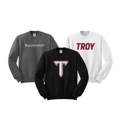 Troy University Crewneck Sweatshirt -UH Spirit Wear Troy University Crewneck Sweatshirt printed with choice of TROY, Troy University or Troy Power T.  Traditional crewneck made of the NuBlend pill resistant fleece. Keep cozy and warm this winter or all year round. Unisex Sizing S-4XL.  White, Black, Charcoal, Athletic Grey, Cardinal, Dark Heather Additional Colors Available Upon Request. 50/50 Cotton/Polyester  NuBlend® Pre-shrunk Fleece 8.0 oz / 271 g NuBlend® pill-resistant fleece Made with sustainably sourced USA grown cotton High stitch density for a smooth printing canvas Tear-away label 1x1 rib collar with spandex Two-needle coverstitching on collar, armholes and waistband 1x1 rib cuffs and waistband with spandex for stretch and recovery Quarter-turned to eliminate center crease Impo Troy University, University Crewneck, Sorority Letters, Spirit Wear, Christmas Wishlist, Black Charcoal, Printed Sweatshirts, 50 50, Crewneck Sweatshirt