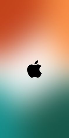 an apple logo is shown on the side of a blurry background with orange, green and blue colors