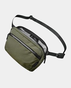 Introducing Go Sling: Your perfect companion for everyday adventure and effortless comfort. Designed to accommodate your daily gear while providing optimal functionality with its detachable padded strap. Versatile Nylon Travel Accessories With Functional Pockets, Versatile Rectangular Nylon Chest Bag, Versatile Rectangular Belt Bag For Outdoor Activities, Versatile Travel Accessories With Adjustable Strap For Outdoor Activities, Versatile Travel Accessories With Adjustable Strap For Outdoor, Functional Nylon Travel Accessories With Adjustable Strap, Versatile Shoulder Bag With Water Bottle Pocket For Outdoor, Versatile Travel Accessories With Functional Pockets, Nylon Belt Bag With Functional Pockets For Everyday Use