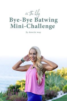 a woman standing in front of the ocean with her arms behind her head, and text overlay that says bye - bye batwing mini - challenge