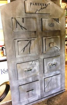 a metal cabinet that has drawers on it