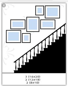 a stair case with pictures on the wall above it and below it is a set of stairs