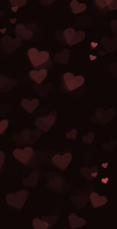 blurry image of hearts in the dark