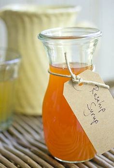 a jar filled with liquid sitting on top of a table