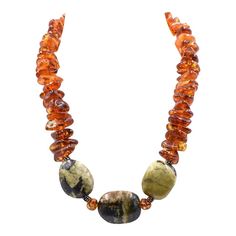 Vintage large freeform baltic honey amber bead necklace featuring sterling silver beaded rondelles as well as an adjustable sterling silver lobster clasp.  The amber is accented by 3 large black and green stones.  The necklace can be adjusted from 17" to 18.40".  The amber beads are approximately .75" wide. Stone Bead Necklace, Amber Bead Necklace, Beaded Jewelry Bracelets, Beaded Necklace Diy, Green Stones, Turquoise Bead Necklaces, Stone Beaded Necklace, Handcrafted Artisan Jewelry, Amber Beads