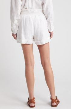 These staple shorts are crafted from crisp linen for laid-back yet polished look and feel. 3" inseam; 31" leg opening; 13" front rise; 16" back rise (size medium) Drawstring waist Side-seam pockets 100% linen Dry clean Imported White Linen Shorts For Loungewear, White Bottoms With Straight Hem For Summer, Linen High-waisted Shorts For Loungewear, Linen Bottoms With Built-in Shorts, White Relaxed Fit Linen Bottoms, Linen Bottoms For Daywear With Short Length, Linen Bottoms For Daywear, Linen Shorts For Daywear, High-waisted Linen Shorts For Daywear