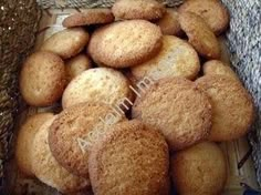 a pile of cookies sitting on top of a table next to some burlies