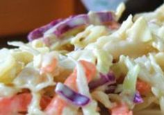 a pile of coleslaw sitting on top of a table