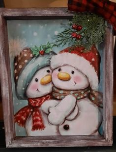 a painting of two snowmen holding each other