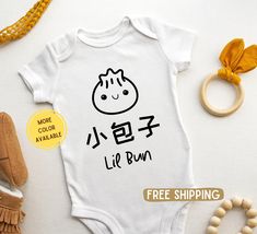 This Chinese Little Bao Dumpling baby toddler bodysuit is a perfect for your little ones or as a baby shower gift, pregnancy announcement, birthday gift, and much much more!  Baby shower gift. Birthday gift for baby. Newborn baby coming back outfit. New baby girl bodysuit. New Baby boy romper. More Family Matching Clothing Designs. Please check out our shop!  🧡https://cheerusstudio.etsy.com // PRODUCT DESCRIPTION // - 100% combed ringspun cotton for solid color  - Other color variations include White Onesie For Summer Gift, White Onesie As Summer Gift, Casual Letter Print Onesie As Gift, Summer Gift White Onesie, Unisex Casual Onesie - Perfect As A Gift, Cute Onesie With Letter Print For Gift, Unisex Casual Onesie As A Gift, Unisex Casual Onesie As Gift, Gift Custom Print Short Sleeve Onesie