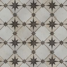 an image of a tile pattern that looks like it is made out of metal stars