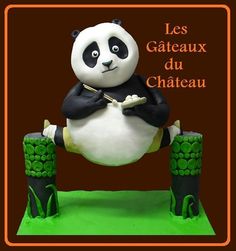 there is a cake made to look like a panda sitting on bamboo sticks with the words les gateaux du chateau